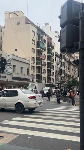 Protesters display 'social crime' banner at Buenos Aires intersection