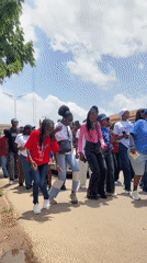 Nurses' procession marches through Jos streets with banners and matching shirts