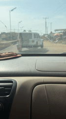 Ambulance spotted on Nigerian road through cracked windshield