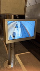 Violin busker performs in Moscow Metro station during evening rush