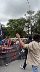 Political demonstration with PCBR flags marches through São Paulo