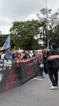 Political demonstration with PCBR flags marches through São Paulo