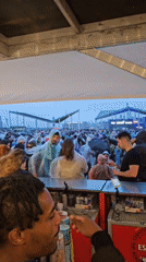 Music festival continues despite rain, LED warnings displayed