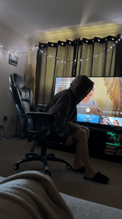 Person in gray hoodie documented in casual indoor moments