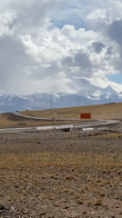 Highway scene documented in mountainous Hor town, China