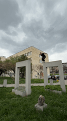 Parkour performer jumps between concrete structures in Shumen