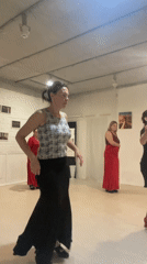 Women practice dance moves in Sochi studio