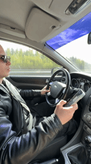 Driver spotted using smartphone while operating vehicle in Russia