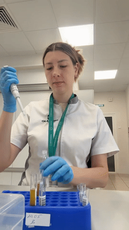 Medical worker conducts early morning lab procedures in Moscow clinic