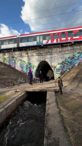 Cyclists gather at graffitied tunnel near Moscow