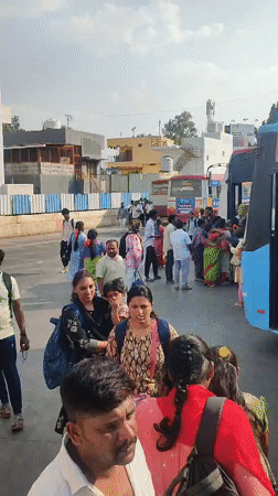 Crowded bus terminal scene captured in Chikkaballapura, India