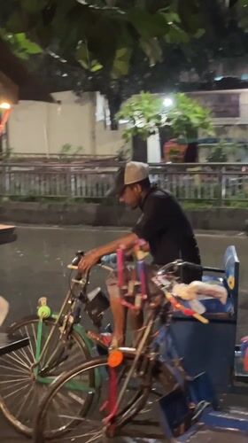 Mixed memories: rickshaw rider, street food, rainy tower view