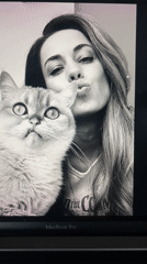 Artist creates pencil portrait of woman and cat in Jos