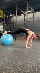Woman completes varied workout routine at Tyumen gym