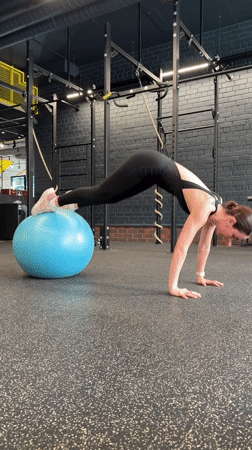 Woman completes varied workout routine at Tyumen gym