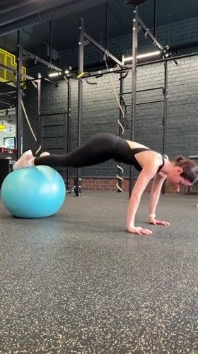 Woman completes varied workout routine at Tyumen gym