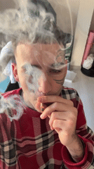 Person smoking cigarette photographed in Buenos Aires