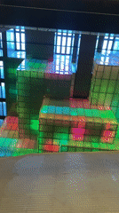 Color-changing cube ceiling display observed in Buenos Aires