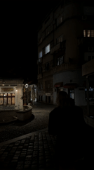 Evening scenes captured in Belgrade: alleyway stroll, postcard display