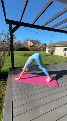 Morning yoga session captured outdoors in Carnikava, Latvia