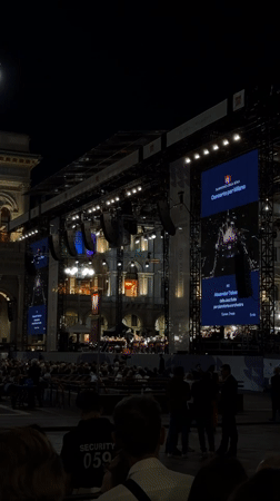 Evening orchestra concert in Milan cathedral square