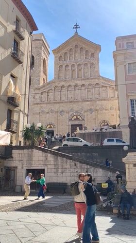 Elderly couple dances at Cagliari Cathedral plaza