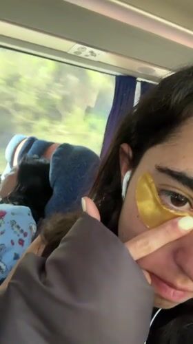 Woman wears beauty mask while traveling on bus in Mexico