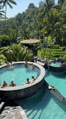 Morning swimmers enjoy pools at Alas Harum Bali resort
