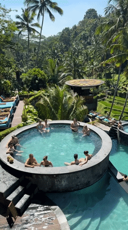 Morning swimmers enjoy pools at Alas Harum Bali resort