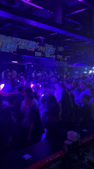 Crowded nightclub scene captured in Sofia with dancing patrons