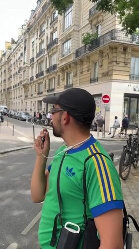 Press crew gathered outside Paris location near police presence
