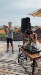 Rooftop party with DJ and dancing in Dalung, Indonesia