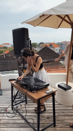 Rooftop party with DJ and dancing in Dalung, Indonesia