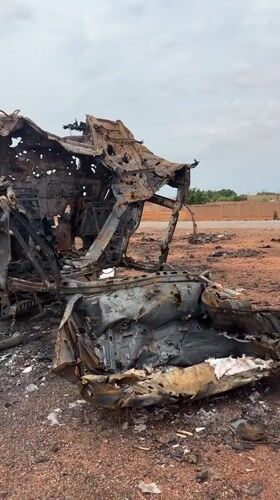 Destroyed vehicle and munitions visible in Um Laba, Sudan