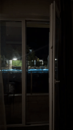 Night at a Hisarya resort: glowing pool, elegant interiors