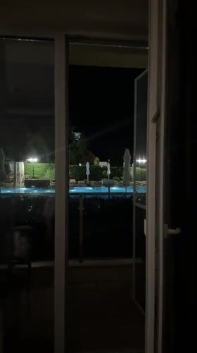 Night at a Hisarya resort: glowing pool, elegant interiors