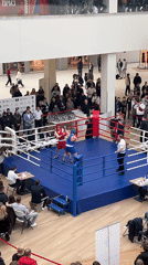 Boxing match draws crowds in Perm shopping mall