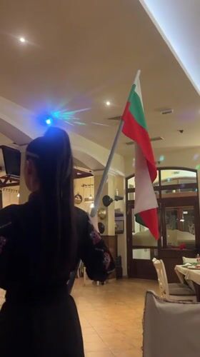 Traditional Bulgarian folk celebration observed in Plovdiv restaurant district