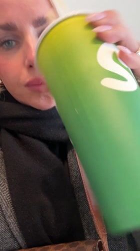 Woman enjoys Nutty Cacao smoothie at Oslo juice bar
