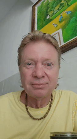 Man demonstrates turmeric in animated indoor video in Denpasar