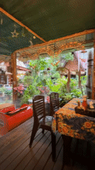 Shaded outdoor restaurant deck in Ao Nang, Thailand