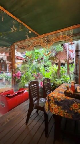 Shaded outdoor restaurant deck in Ao Nang, Thailand