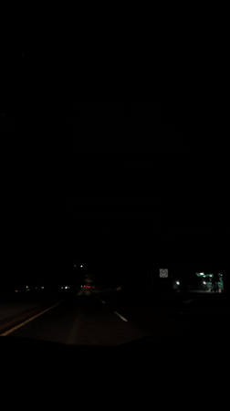 Late-night highway traffic and indoor TV viewing in Puebla area