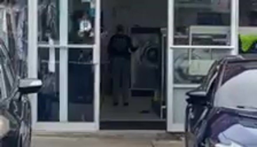 Police investigate incident at NYC laundromat storefront