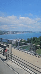Tourist captures sunny Bosphorus views from Istanbul bridge