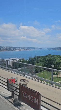 Tourist captures sunny Bosphorus views from Istanbul bridge