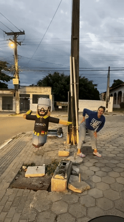 Evening street scenes with inflatable ads captured in Florianópolis
