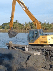 Excavator conducts dredging operations in Lhokseumawe waters