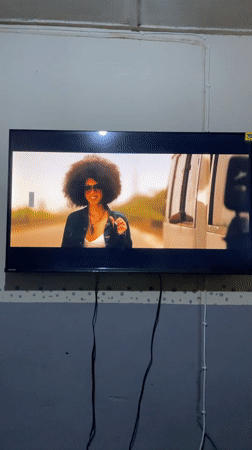 Music video with woman, white van observed on TV in Jos