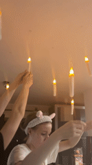 Saint Petersburg resident installs ceiling candles, plays games